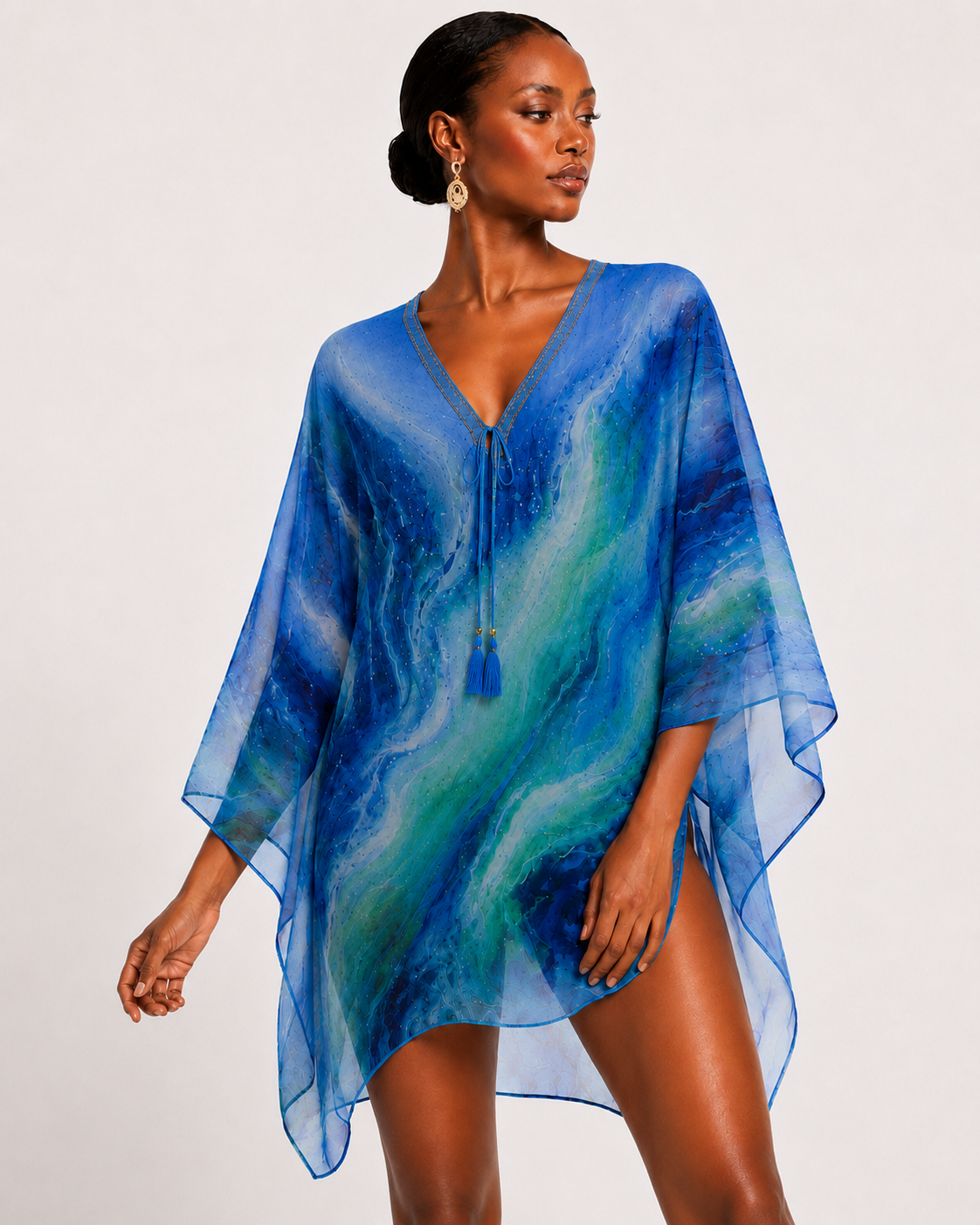 Art-inspired beachwear featuring expressive hibiscus color and movement
