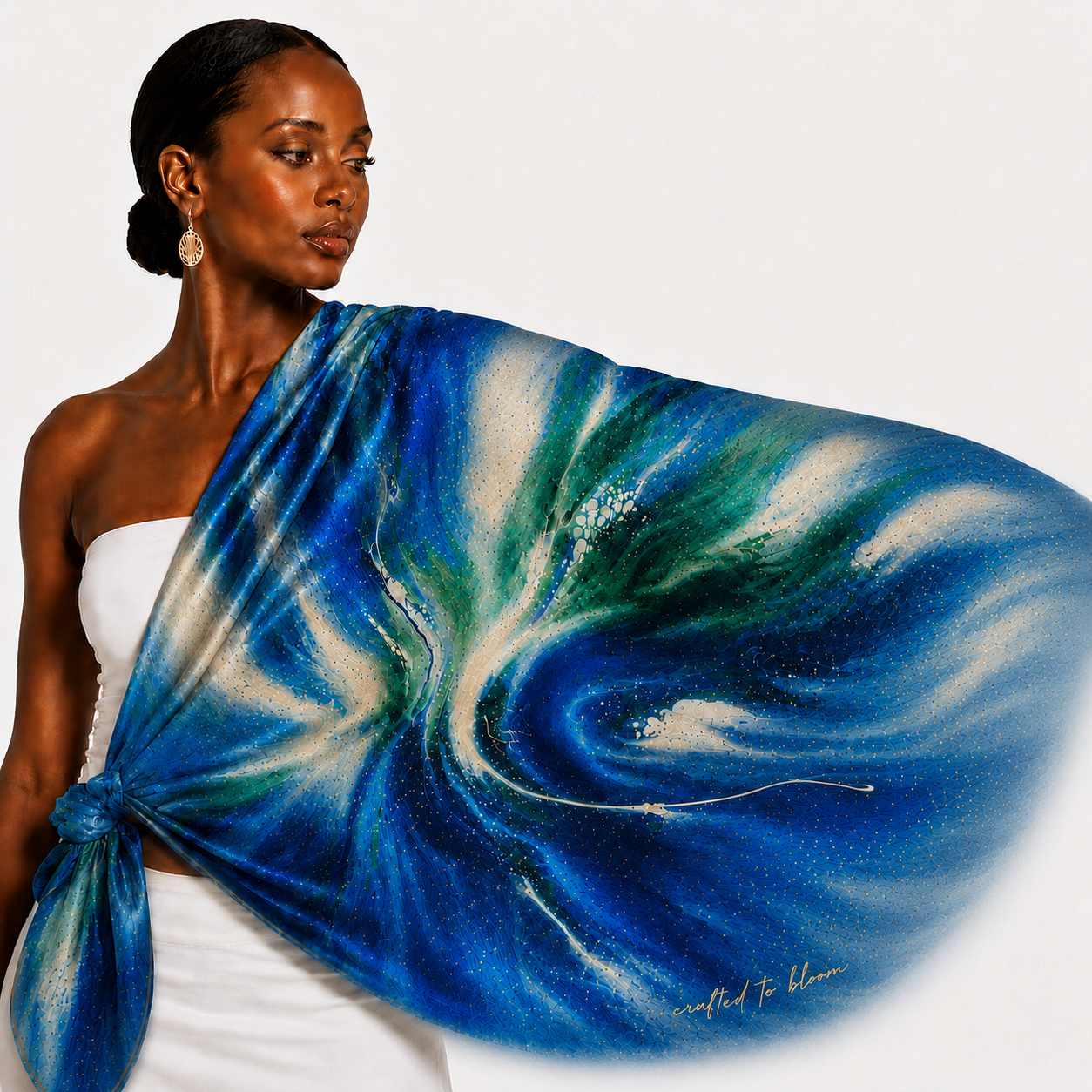 Shawls and scarves featuring flowing blue floral artwork